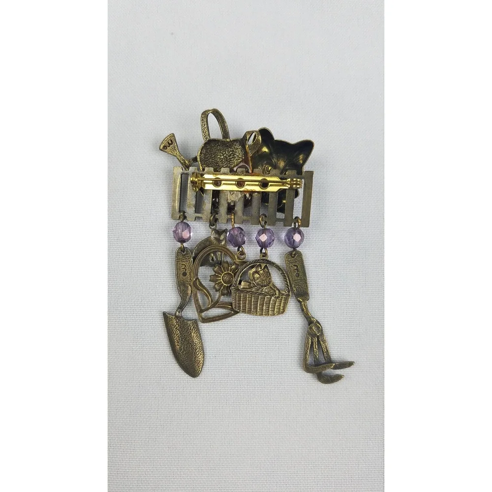 Vintage JJ brooch pin gold tone cat head on fence gardening tools